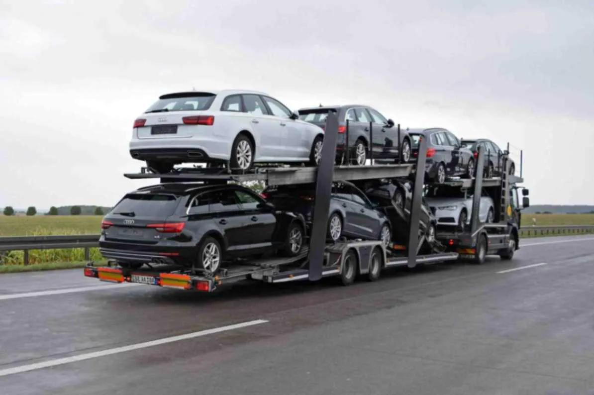 Truck transporting cars